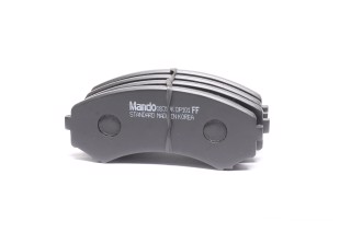 Колодки тормозные дисковые передние MAZDA MPV (пр-во Mando)