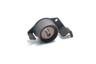 Ролик натяжний ГРМ 57х33 MITSUBISHI Carisma 1.6/1.8 95-06 Colt 1.6 95-05 (вир-во KOYO)