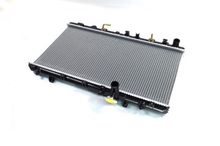 Радиатор охлаждения SUZUKI SX4 (EY, GY) (06-) 1.6i АТ (пр-во Nissens)