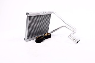 Радіатор обігрівача HYUNDAI TUCSON / KIA SPORTAGE II (KM) (04-) (вир-во Nissens)