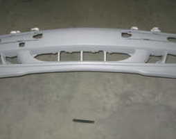 Бампер пер. MB 210 99- (вир-во TEMPEST)